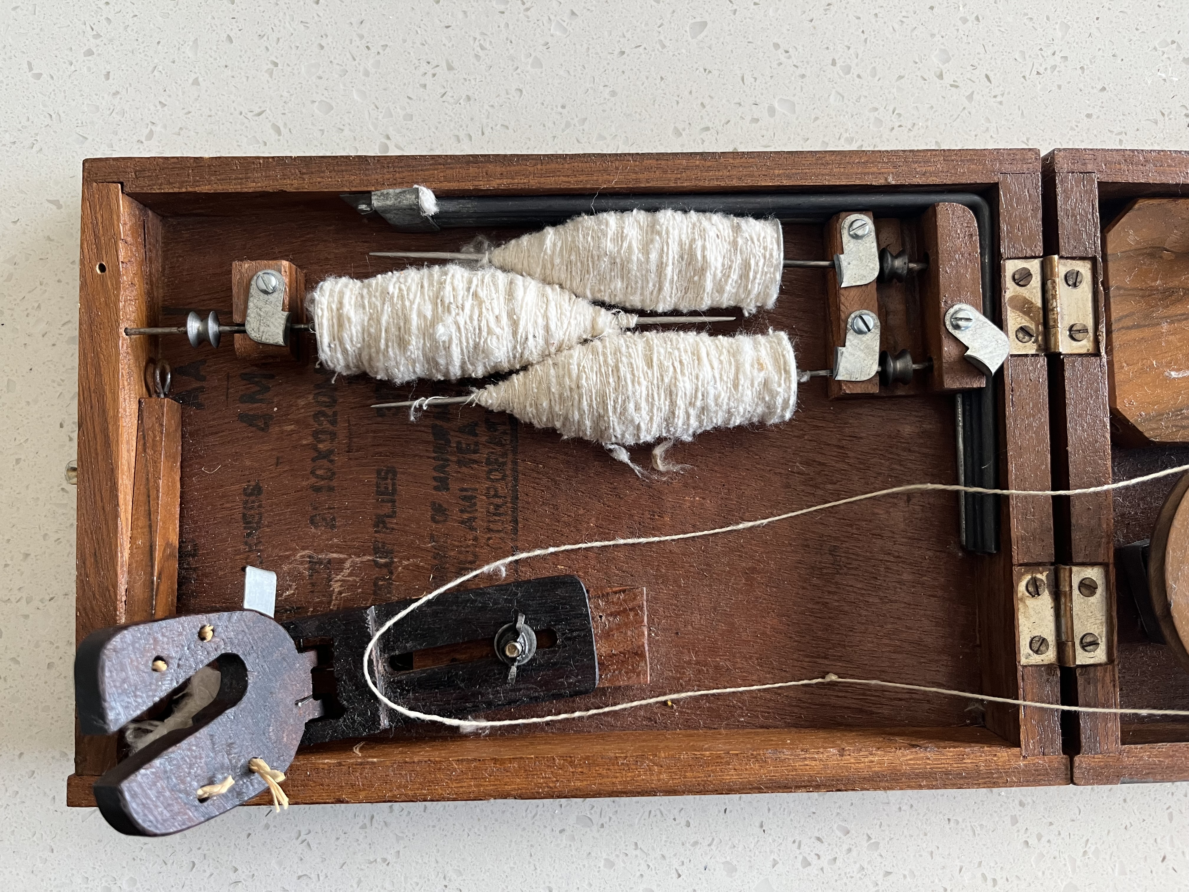 Spinning silk on a Charkha