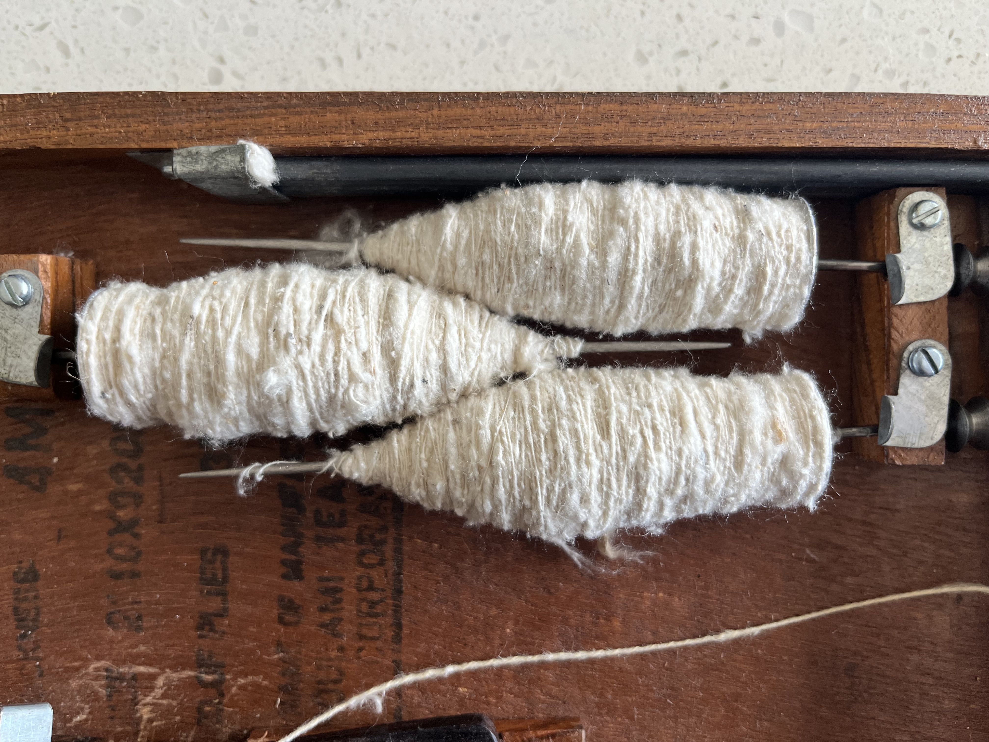 Spinning silk on a Charkha