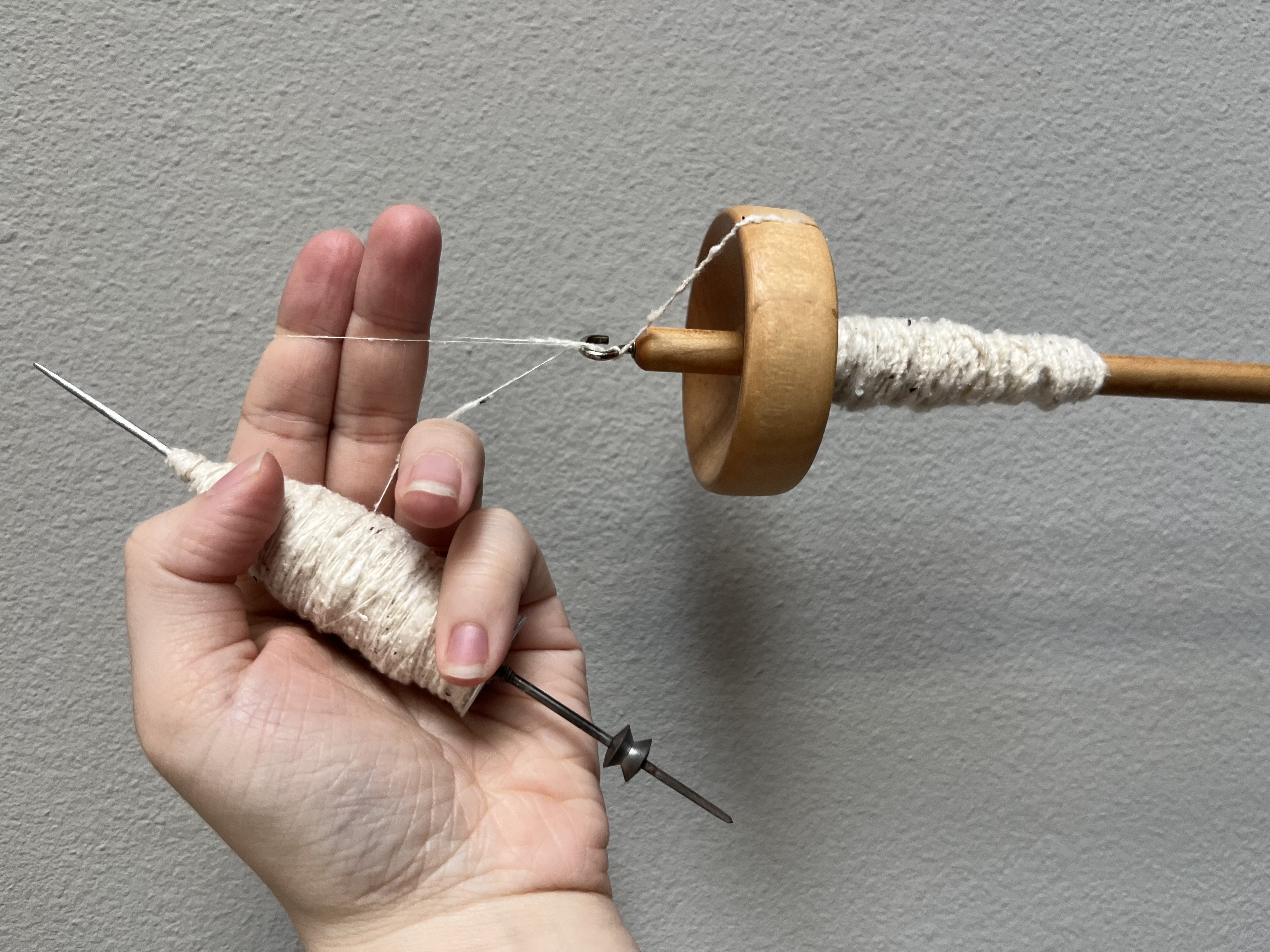 Spinning silk on a Charkha